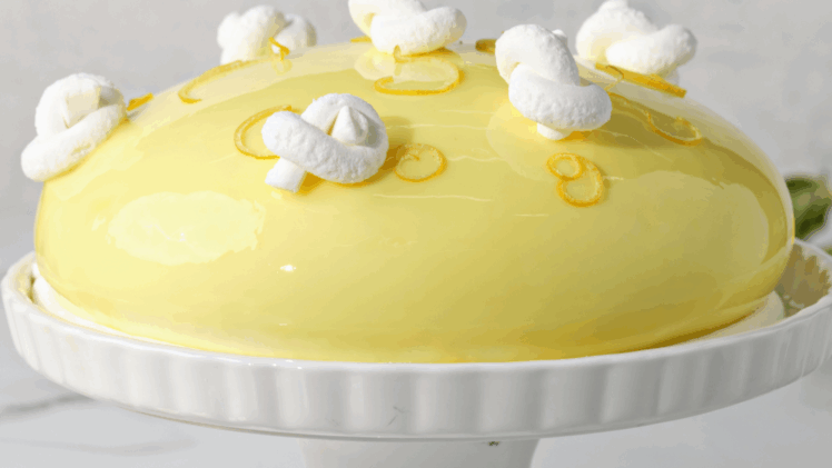 a mousse cake on a cake stand